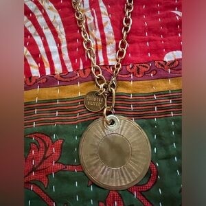 Twisted silver gold disc necklace